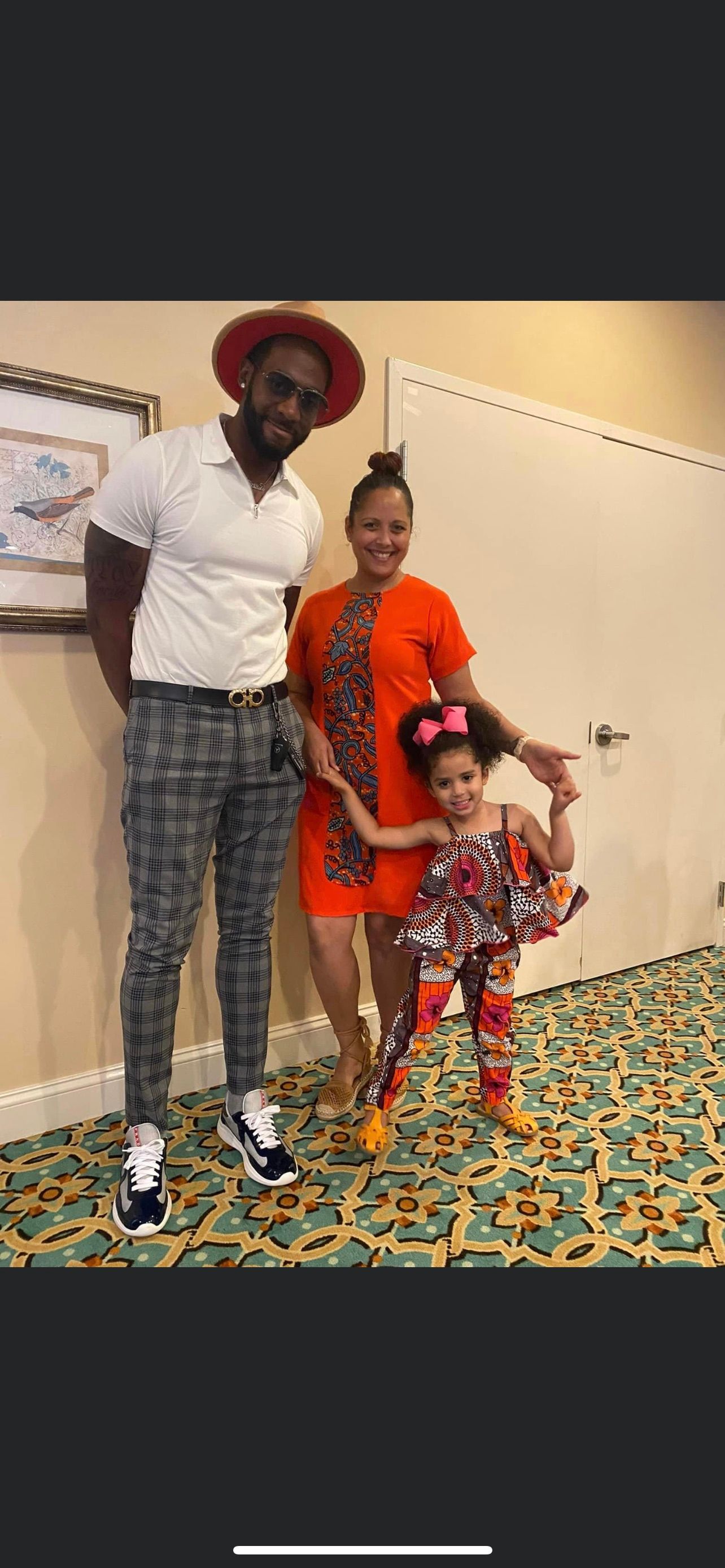 Family in African attire at gala