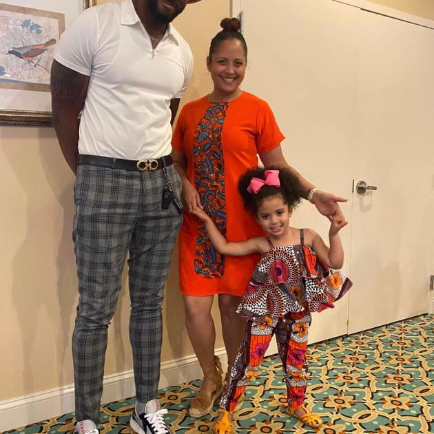 Family in African attire at gala