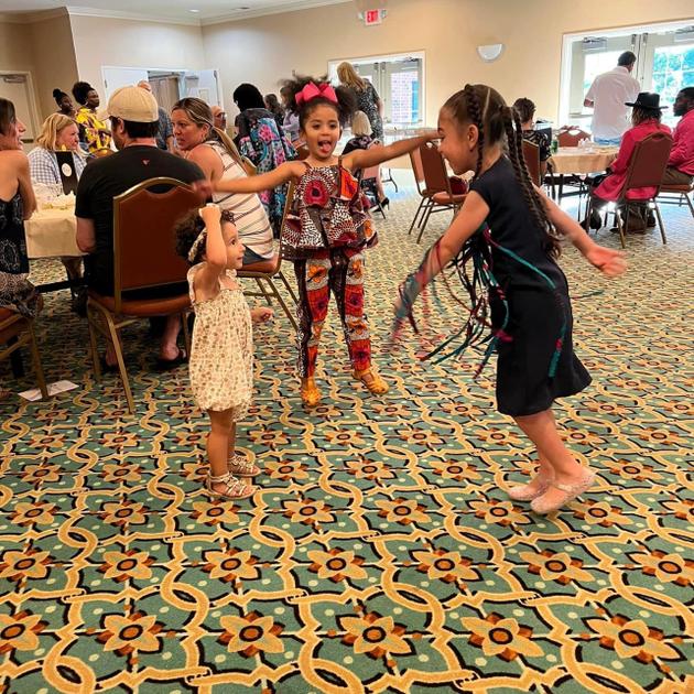 Kids dancing at community event